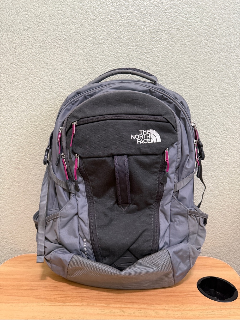 The North Face Gray and Black Backpack with Pink Zipper Pulls